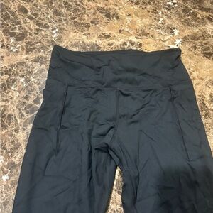 Women’s black jockey workout leggings with a side pockets size medium